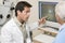 Doctor Next To Equipment To Detect Glaucoma