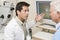 Doctor Next To Equipment To Detect Glaucoma