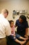 Doctor and Nurse Check Young Patient