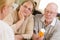 Doctor or Nurse Explaining Prescription Medicine to Senior Couple