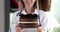 Doctor or nurse is holding chocolate cake in clinic