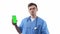 Doctor nurse in uniform and with a stethoscope points to a smartphone with a green screen advertising medical