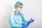 Doctor, nurse wearing protection Suit for Fighting Covid-19 Coronavirus with white background. Medical worker wearing protective