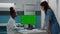 Doctor and nurse working with horizontal green screen