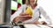 Doctor nutritionist holding out pear fruit in clinic closeup 4k movie slow motion