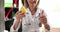 Doctor nutritionist holds yellow pear thumbs up