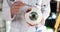 Doctor ophthalmologist showing with pen structure of eye on anatomical model closeup 4k movie slow motion