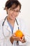 Doctor with an orange