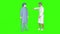 The doctor and the patient communicate green background