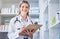 Doctor, pharmacy checklist and employee portrait in pharmaceutical clinic, medical supply store and nurse stock