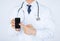 Doctor pointing at smartphone