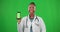 Doctor portrait, green screen or black woman with phone for marketing, advertising or product placement. Happy, digital