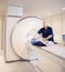 Doctor Preparing Woman For MRI Scan In Laboratory