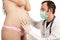 Doctor probes stomach pregnant woman