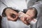 Doctor with Russian money in handcuffs. The concept of corruption in medicine and bribery