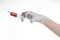 Doctor\'s hand holding a syringe, white gloved hand, a large syringe, the doctor makes an injection, white background