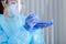 Doctor\'s hands performing antigen analisys of the fluid sample