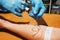 Doctor`s hands with a syringe for injection to the patient