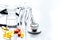 Doctor`s instruments and pills in medical set on white background