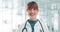 Doctor, smile and hospital in portrait for healthcare, pride and medical advice. Female surgeon, happy and confident in