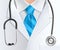 Doctor, stethoscope and blue tie background