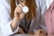 Doctor with a stethoscope in the hand. Physician is ready to examine her female patient.