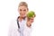 Doctor, studio portrait and woman with apple for nutrition, wellness and health by white background. Happy isolated