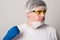 Doctor in a surgical mask, gloves and glasses. Surgeon before the operation. Man in a medical mask