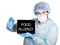 Doctor in surgical uniform, holding test tube and digital tablet pc with food allergy sign. internet technology and