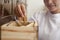 Doctor Taking Herb Used for Traditional Chinese Medicine Out of a Drawer