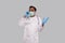 Doctor Talking on Phone Excited, Wearing Medical Mask and Gloves. Indian Man Doctor with Phone Isolated