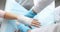 Doctor traumatologist bandaging patient hand with bandage in clinic closeup 4k movie