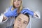 The doctor trichologist conducts mesotherapy or plasma therapy. Treatment of alopecia. Hair loss, alopecia, pruritus, burning head