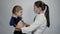 Doctor Uses Stethoscope On Little Girl