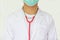 Doctor in white coat, green mask and red stethoscope