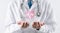 Doctor in white coat holding heartbeat icon for positive healthcare insurance symbol concept, Mental health care, medical check up