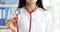 Doctor in white coat holds stethoscope slow motion 4k movie