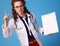 Doctor woman with clipboard and raised fingers drawing attention