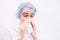 Doctor woman Cough in tissue covering nose and mouth when coughing as COVID-19