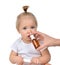 Doctor Woman hand using medicine nose spray nasal for baby toddler child kid