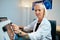 Doctor Woman Working In Hospital Office With Computer Technology Equipment