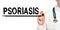 Doctor writes the word - PSORIASIS. Image of a hand holding a marker isolated on a white background