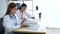 Doctor writing prescription for medical health care oncologist therapy using laptop. Two women doctors consultation with professio