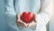 Doctors Hand Holding Red Heart Shape in Hospital - Love, Donor, World Heart Day, Health Insurance Concept AI Generated