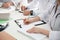 Doctors having meeting at table in office