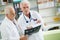 Doctors holding xray in medical office