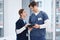 Doctors, man and woman with tablet at hospital with discussion, healthcare and teamwork. Medical professional, nurse and