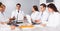 Doctors in negotiations in conference room