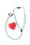 Doctors stethoscope and one red heart on white background