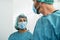 Doctors wearing ppe equipment face surgical mask and visor fighting against corona virus outbreak